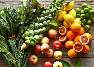 a group of fruits and vegetables on a wood surface Healthy Weight Loss Diets Holme Chapel